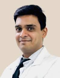Dr Satyam G